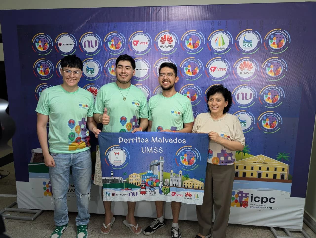 Perritos Malvados with their coach before the Latin America Championship
